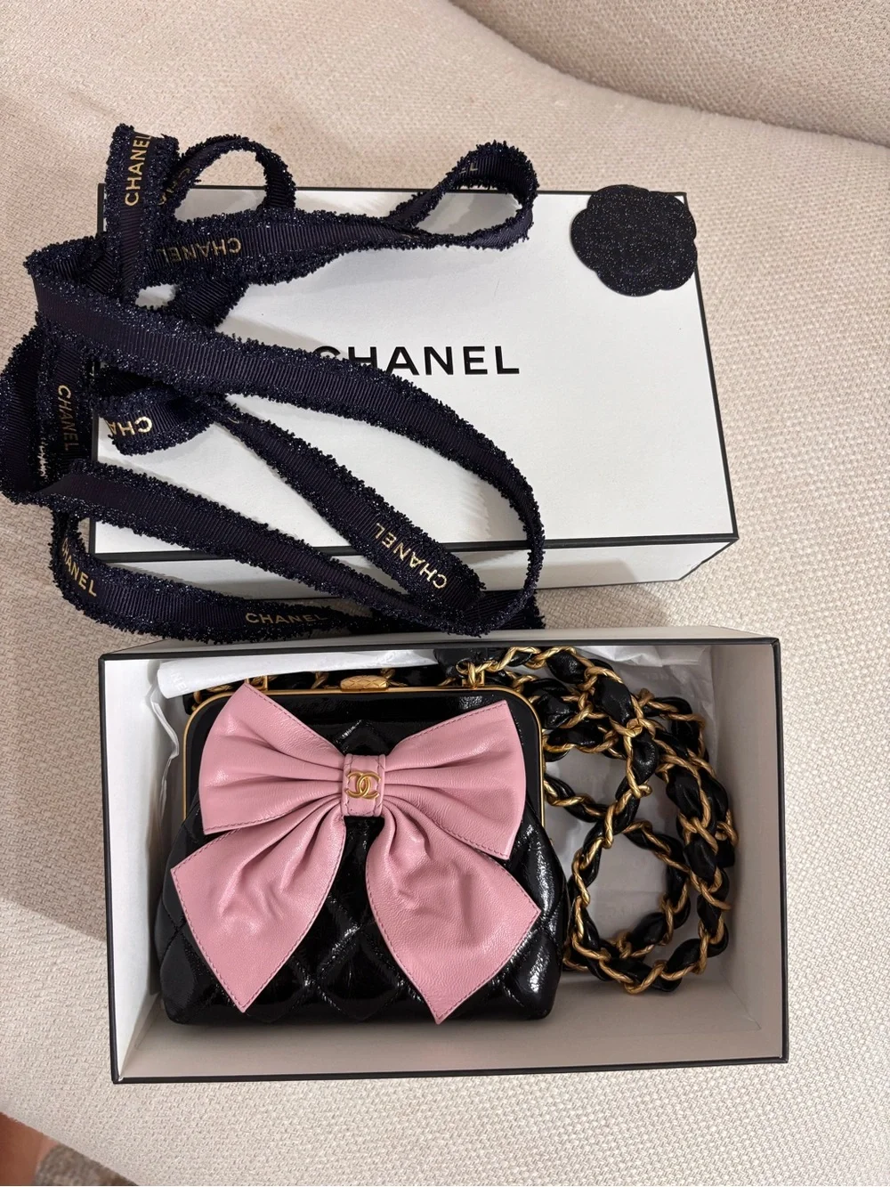 Authentic CHANEL mini pink bow black lambskin patent leather crossbody bag
